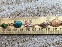 Load image into Gallery viewer, Cute Tiny Jewelry Making Charms - 5 Pieces - Starfish - Clam - Conch - Crafts - Jewelry Making - DIY - Beads - Bracelet - FREE SHIPPING!
